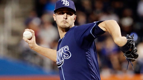 Tampa Bay Rays' Jake Odorizzi delivers a pitch during the first inning of a baseball game against the New York Yankees in New York. The Twins have acquired Odorizzi from the Rays for minor league infielder J