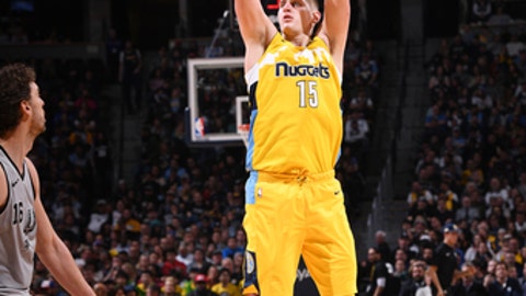 DENVER CO- FEBRUARY 23 Nikola Jokic #15 of the Denver Nuggets shoots the ball during the game against the San Antonio Spurs