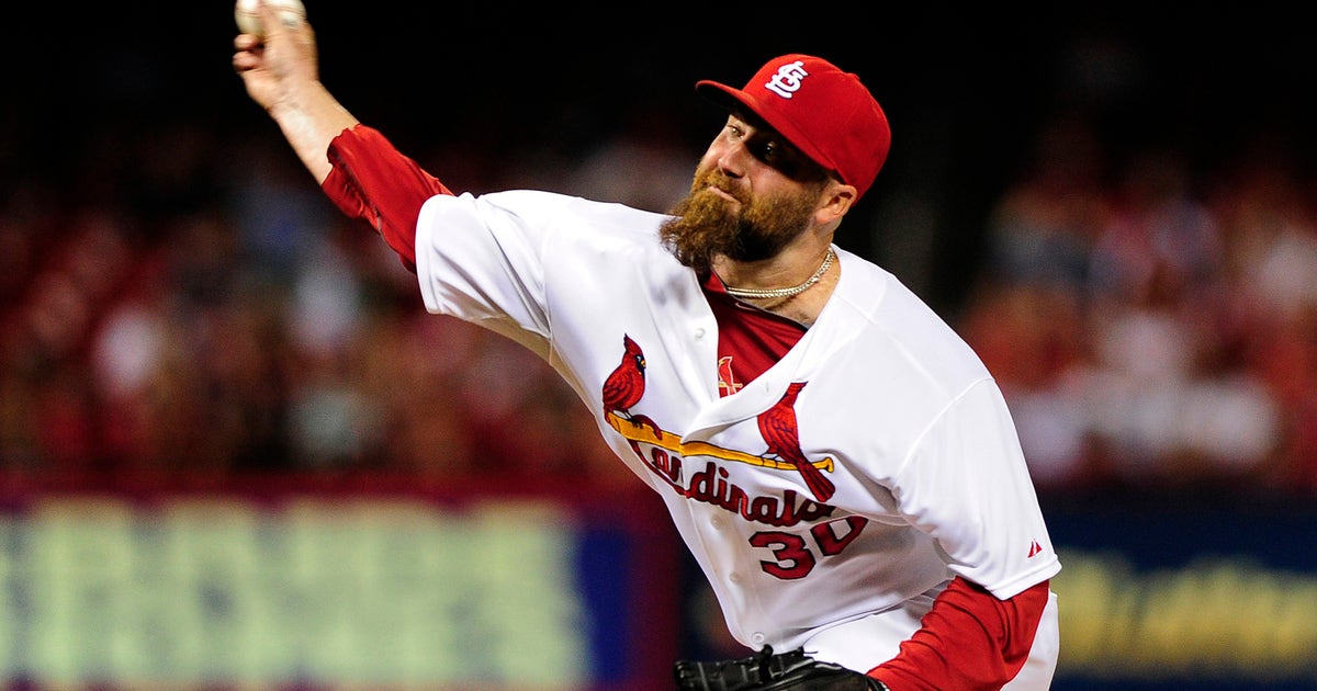 Motte is 'back at home' in second stint with Cardinals
Motte is 'back at home' in second stint with Cardinals