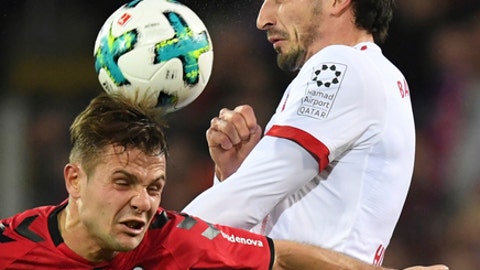 Bayern Munich thump Freiburg to close in on title Bayern Munich thump Freiburg to close in on title