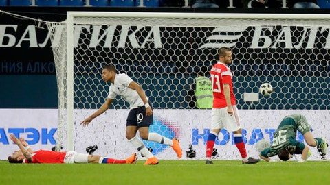 Federation Internationale de Football Association probes racist abuse from Russian fans