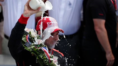 Will Power of Australia celebrates after winning the Indianapolis 500 auto race at Indianapolis Motor Speedway in Indianapolis Sunday