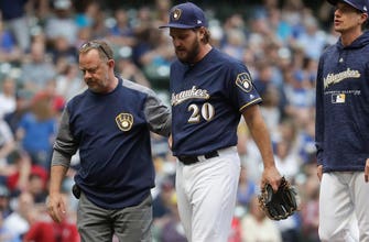 
					Brewers reinstate Wade Miley, release Eric Sogard
				