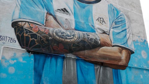 Birkir Bjarnason and Hordur Magnusson hold Lionel Messi and Argentina Birkir Bjarnason and Hordur Magnusson hold Lionel Messi and Argentina