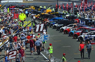The Latest: Truex takes early lead from Larson in Sonoma
