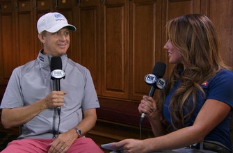 
					David Toms talks with Holly Sonders after shooting 4-under on Saturday to move into 2nd place
				