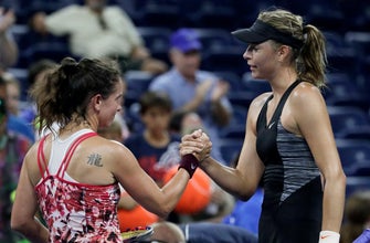 
					At 39, Schnyder returns to Slam tennis; loses to Sharapova
				