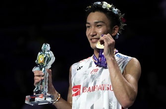 
					Momota, Marin capture world badminton titles
				