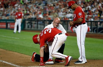 
					Bryce Harper pulled after being hit in knee by pitch
				