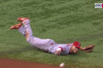 
					WATCH: Andrelton Simmons makes diving catch, flips ball to David Fletcher for the out
				
