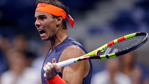 Rafael Nadal of Spain watches a shot during a match with Dominic Thiem of Austria during the quarterfinals of the U.S. Open tennis tournament early Wednesday Sept. 5 2018 in New York