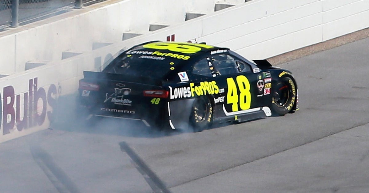 Jimmie Johnson spins in the tri-oval and hits the wall