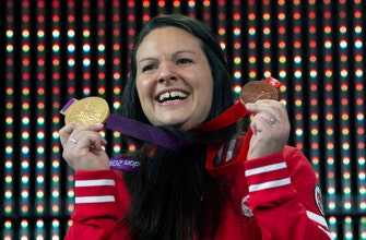 
					Canadian weightlifter upgraded to Olympic gold, bronze
				