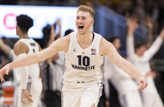 
					Howard, Hausers, No. 15 Marquette beat Providence 79-68
				