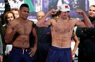 Alvarez makes 1st title defense in rematch with Kovalev