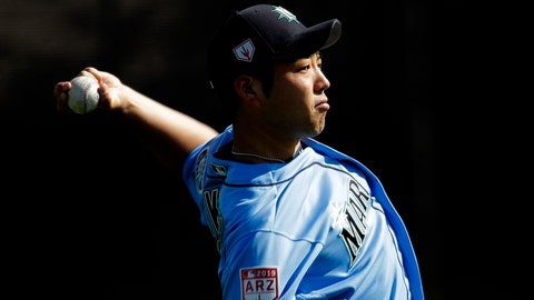 Seattle Mariners pitcher Yusei Kikuchi of Japan throws during spring training baseball practice in Peoria Ariz. Whether he wants to be or not Kikuchi’s rookie season is a science experiment
