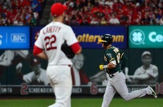 
					Cardinals can't cash in on multiple chances, lose to A's 7-3
				