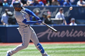 
					Sparked by a five-run third inning, Royals top Blue Jays 7-6
				