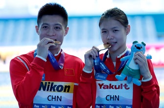 
					China wins mixed team diving event
				