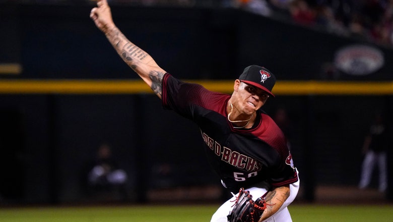 Escobar homers late, Arizona tops Dodgers in a wild one