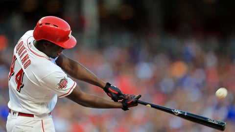 Cincinnati Reds' Aristides Aquino hits a solo home run his second home run of the game in the third inning of a baseball game against the Chicago Cubs Saturday Aug. 10 2019 in Cincinnati