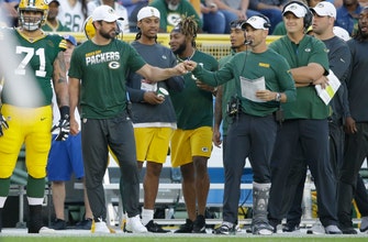 Rodgers held out of preseason game with back tightness