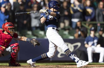 
					Brewers' Yelich looks to continue torching Cardinals in critical series
				