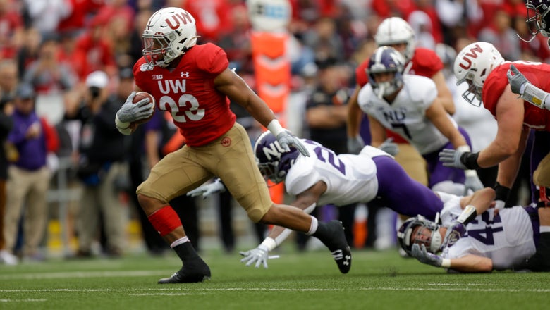 Taylor, defense lead No. 8 Badgers past Northwestern 24-15