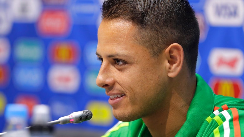 Sevilla signs Mexico striker Chicharito for 3 seasons