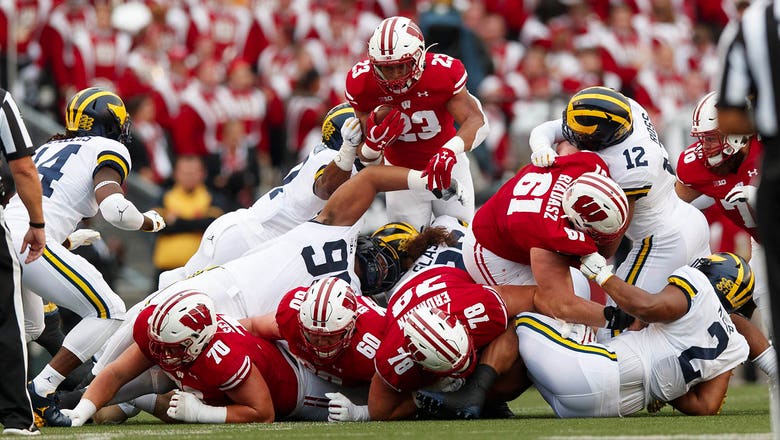 Jonathan Taylor, Badgers roll past Michigan