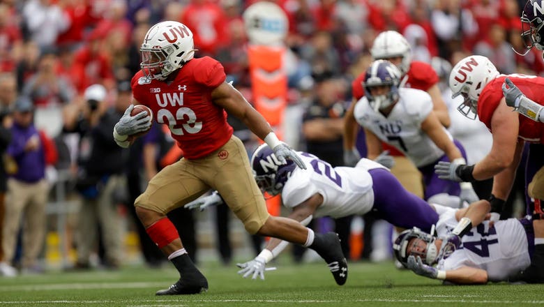 Taylor, No. 8 Badgers stay perfect with 24-15 victory