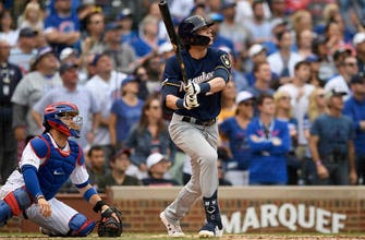 Yelich, Brewers top Cubs 4-0 to clinch series win in Chicago