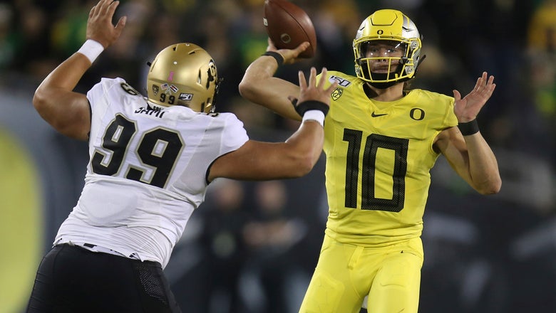 Herbert has 2 TDs in No. 13 Oregon's 45-3 win over Colorado