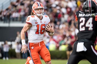 
					Lawrence, No. 3 Clemson dominate South Carolina 38-3
				