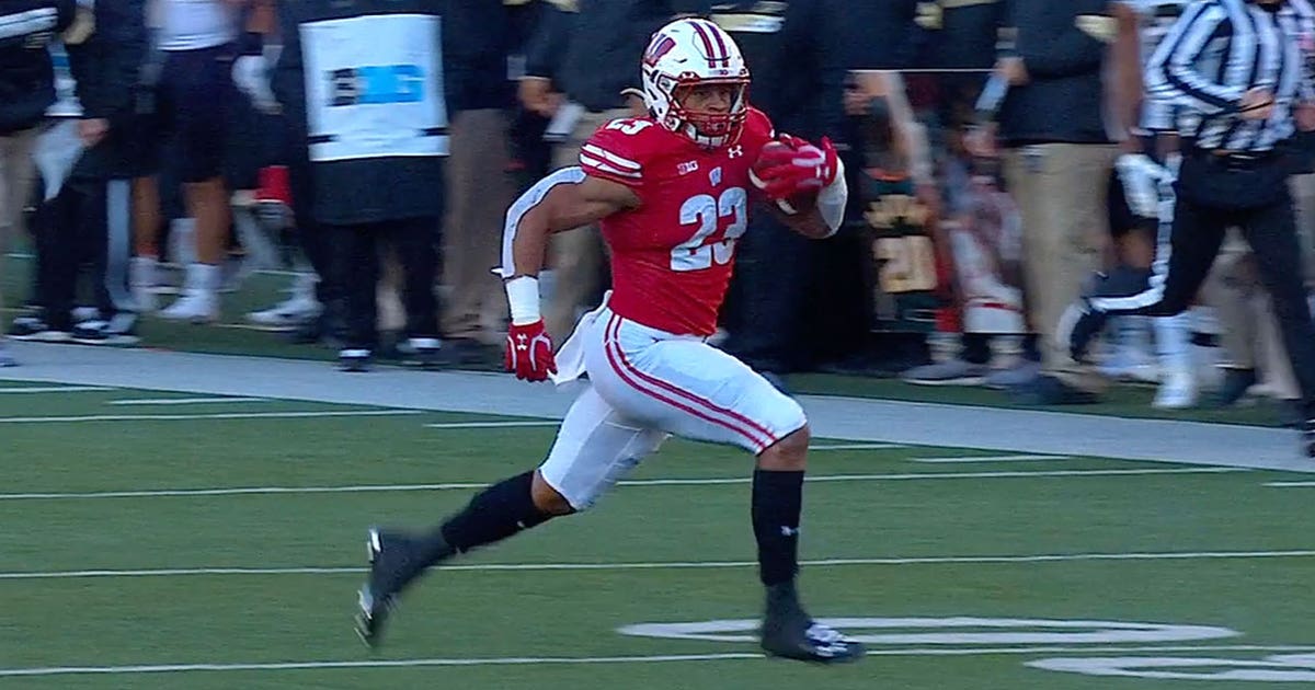 Jonathan Taylor’s 51-yard touchdown run extends Wisconsin’s lead over ...