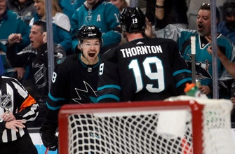 
					Sharks beat Canucks 4-2 to snap 6-game skid
				