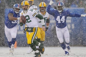 
					Upon Further Review: Packers unleash Rodgers in snowy win
				