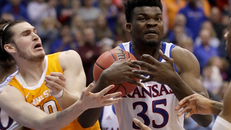 Dotson scores 22, leads No. 3 Kansas past Tennessee 74-68