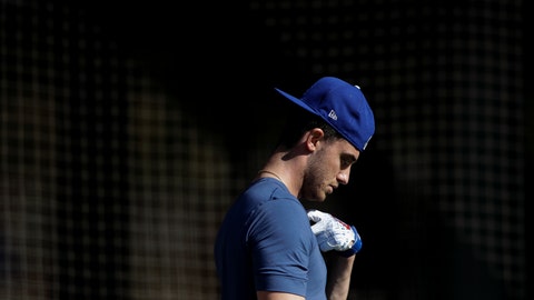 Los Angeles Dodgers center fielder Cody Bellinger leaves the batting cages during spring training baseball Friday Feb. 14 2020 in Phoenix