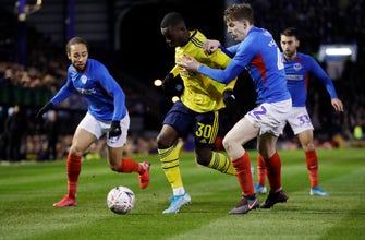 Arsenal overcomes Portsmouth 2-0 to reach FA Cup 6th round