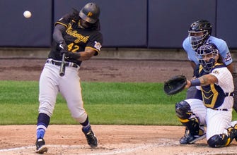 Woodruff suffers rare loss at Miller Park, Brewers fall 5-1