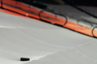 NHL suspends use of microchipped pucks six days into season