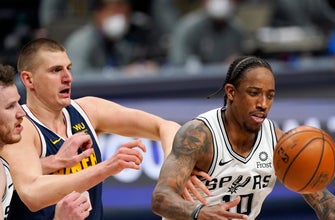 
					Jokic leads Nuggets to 8th straight win by beating Spurs
				
