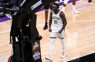 Holiday's huge payday, Bucks give guard maximum extension