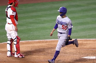 Dodgers’ 13-0 lead nearly evaporates, but they hold on to beat rival Angels, 14-11