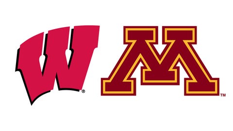 MI builds huge lead, holds on at Wisconsin