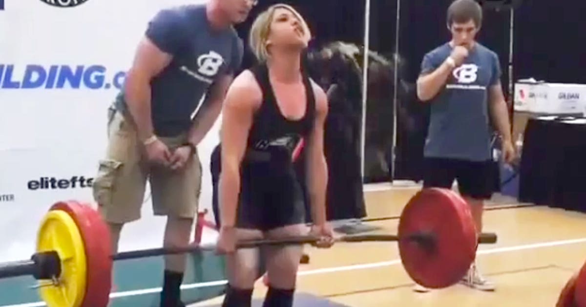 Female powerlifter pukes during her lift, then responds like a champ
