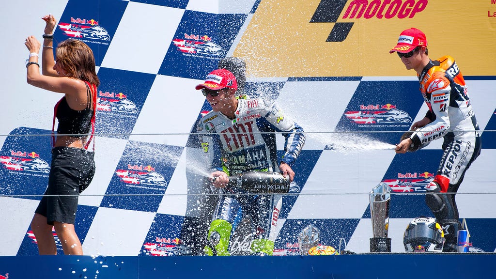 In Hamilton S Defense Photos Of Podium Girls Getting Sprayed With Champagne Fox Sports