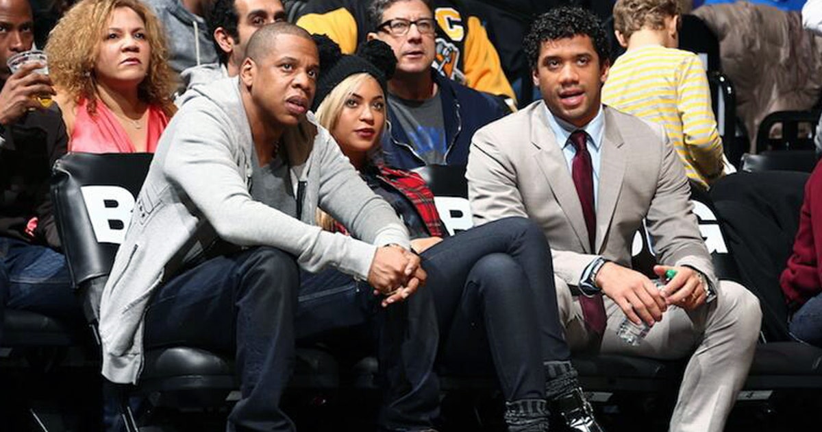 Russell Wilson sits courtside with Jay Z and Beyonce at