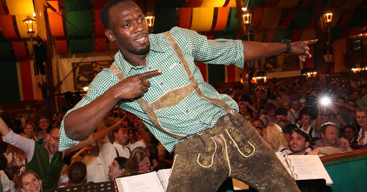 Usain Bolt sports lederhosen, parties the oom-pah-pah out of